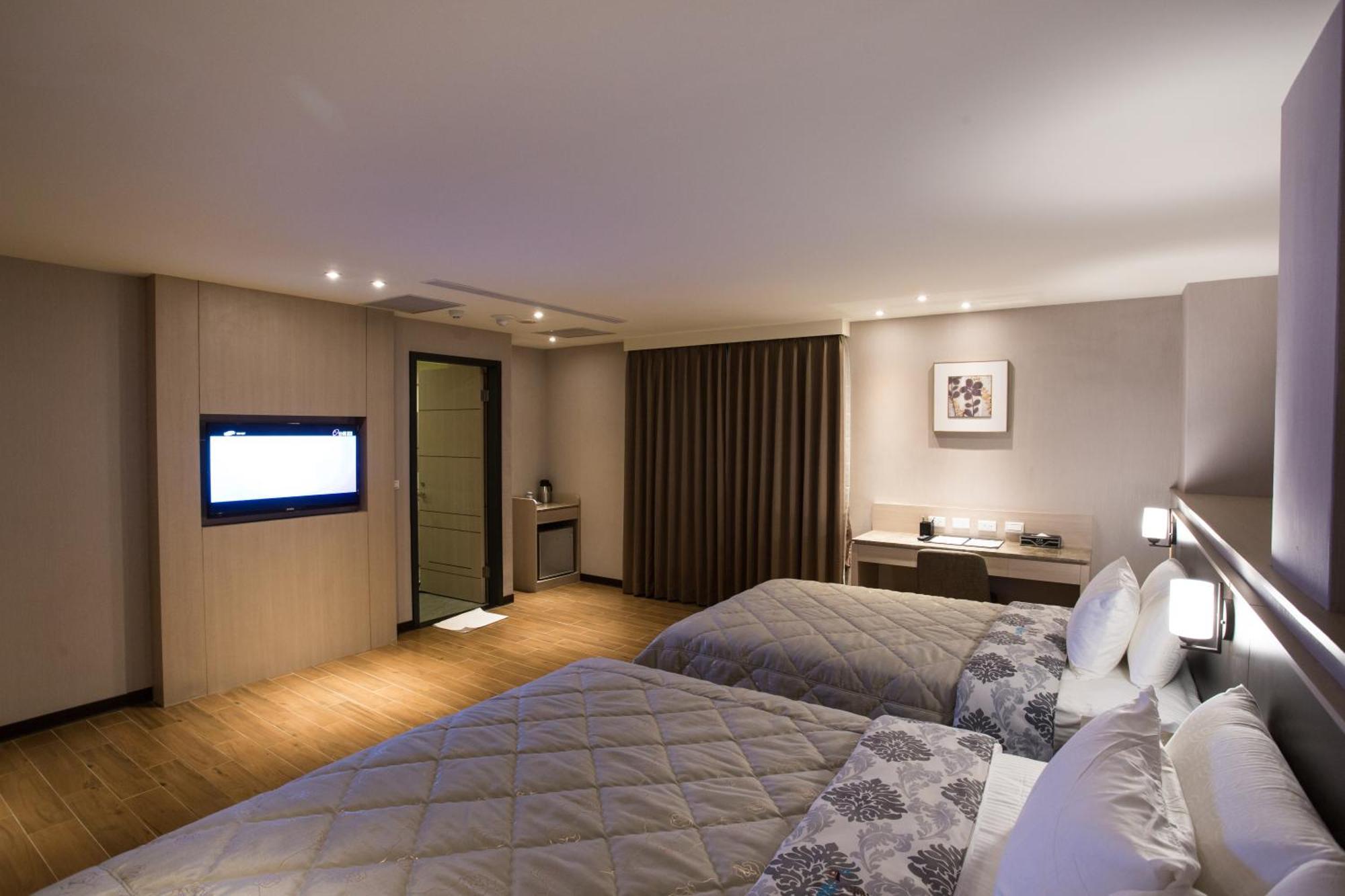 Verygood Business Hotel Huatan Habitación foto