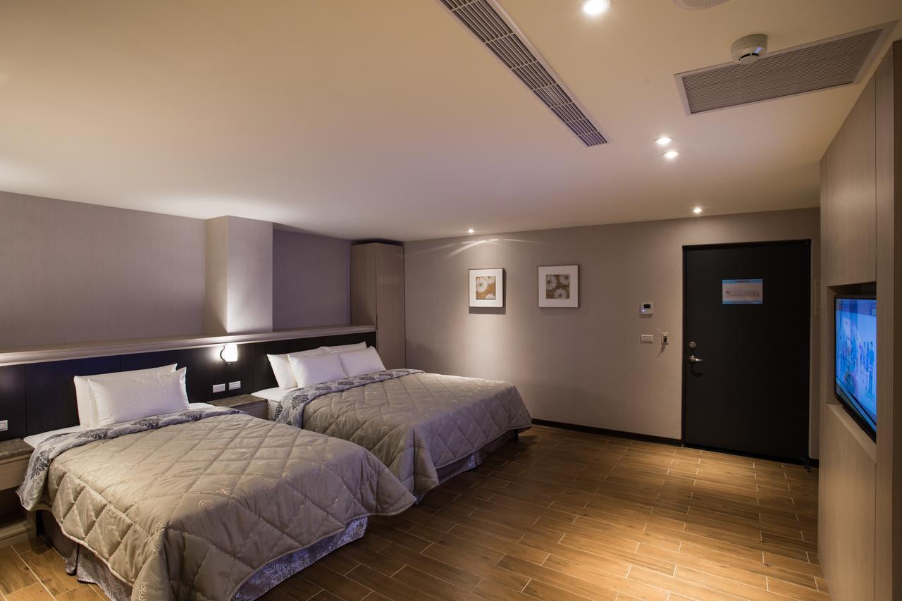 Verygood Business Hotel Huatan Habitación foto